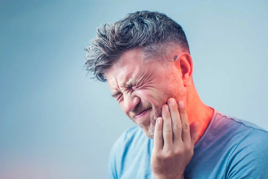 Person Suffering from TMJ Pain In Toronto, ON